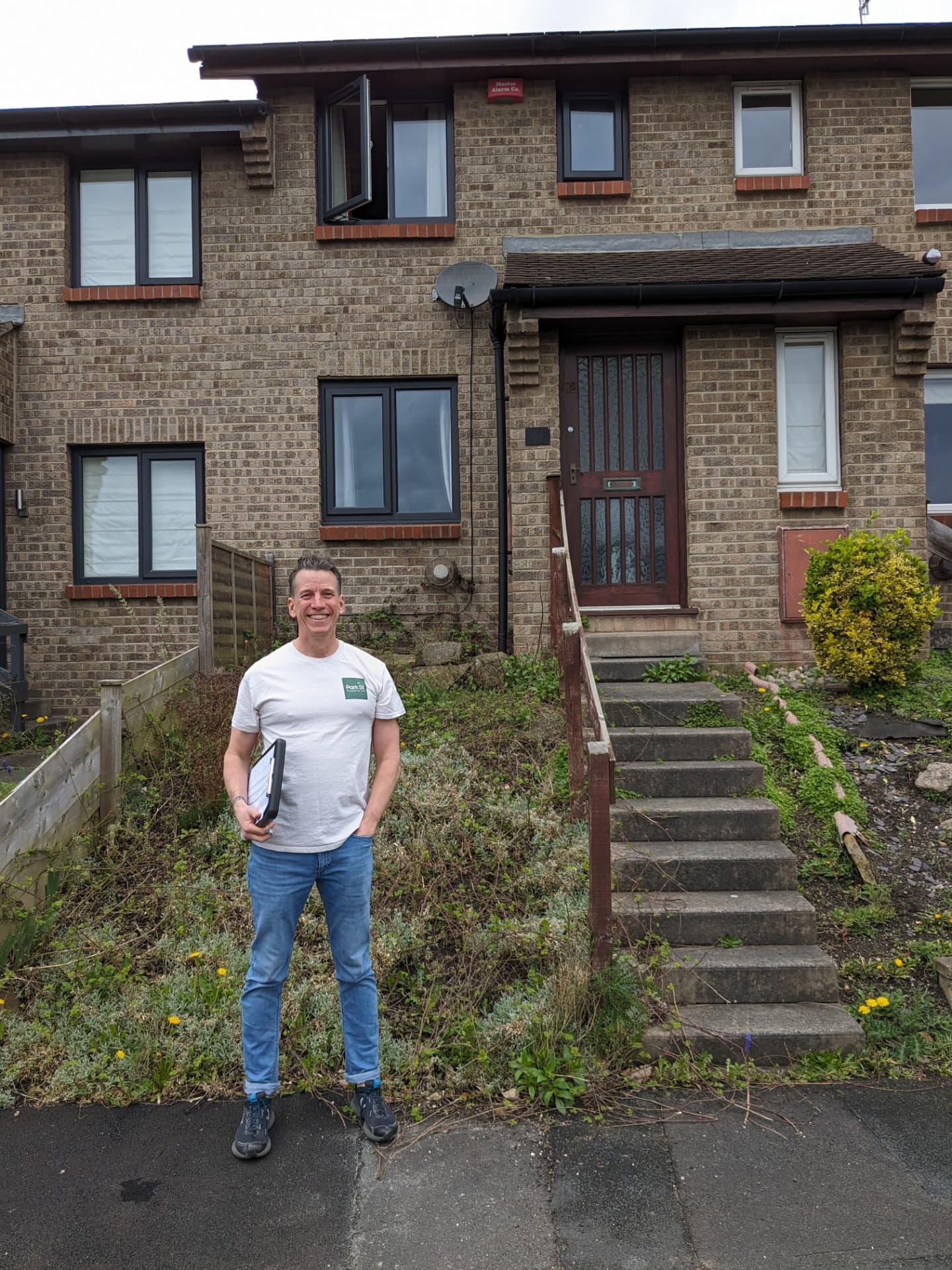 Nev out viewing properties in the Leeds region, clipboard in hand