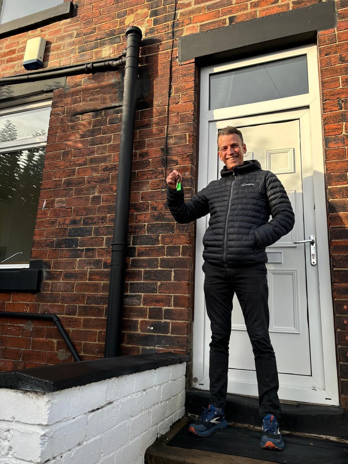 Nev collecting the keys on completion day